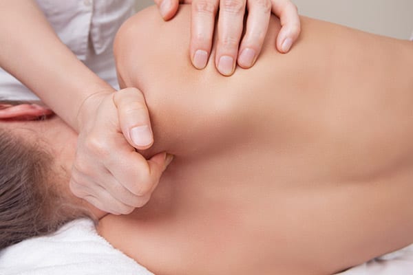 Remedial massage treatment helping to improve blood circulation